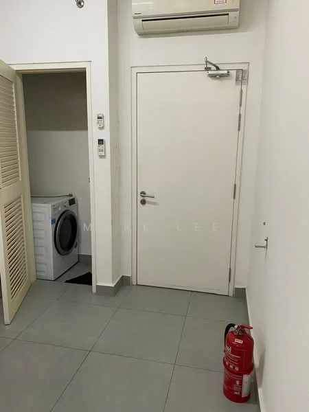 Laundry features: front-load washing machine, grey tile flooring, white painted walls, wall-mounted split AC, fire extinguisher, door with handle, sliding door to closet, light switch, power outlet.