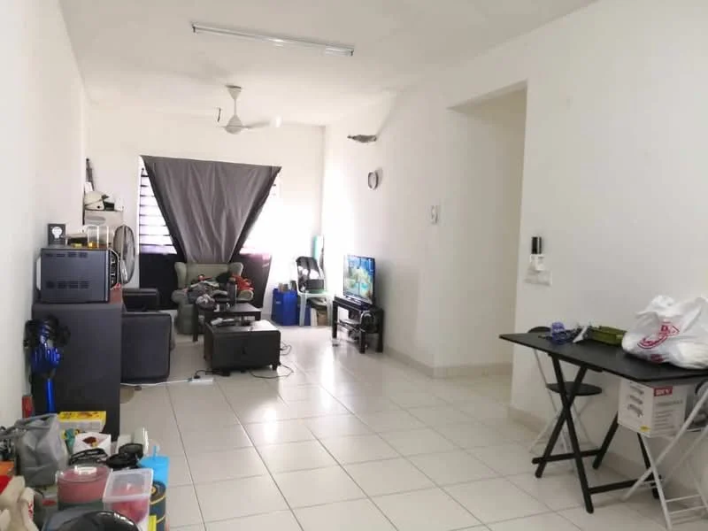 Living features: white painted walls, tile flooring, 5-blade ceiling fan, sofa in black, coffee table, TV console, wall-mounted TV, area rug, window with grey curtains, decorative wall clock, small side table, various storage boxes.