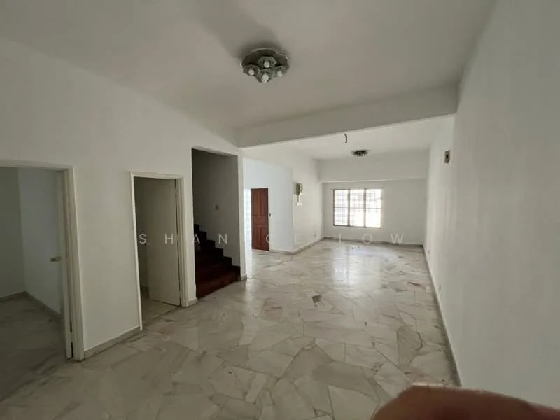 Room features: white painted walls, marble flooring, ceiling light fixture, large windows, staircase visible in background, doorway leading to another room, doorway leading outside.