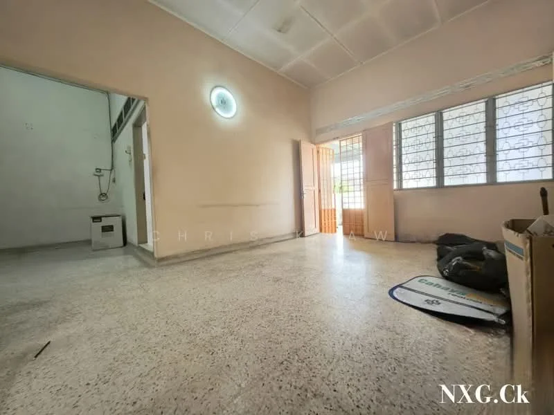 Room features: light-colored painted walls, grey terrazzo flooring, ceiling with recessed lights, large windows with metal grilles, door leading outside, corner with plumbing fixtures, box on the floor, unfurnished space; style: minimalist.