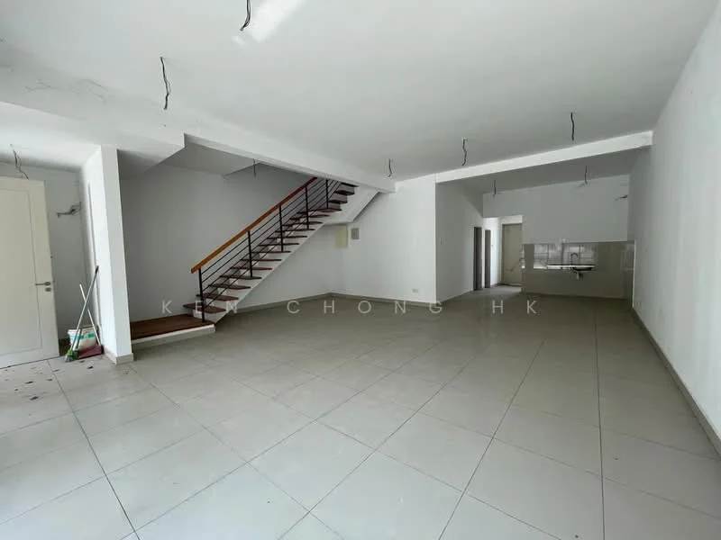 Room features: white painted walls, tile flooring, staircase with wooden railing, open layout, multiple light fixtures, large windows, kitchen area visible in background, no visible furniture; style: minimalist.