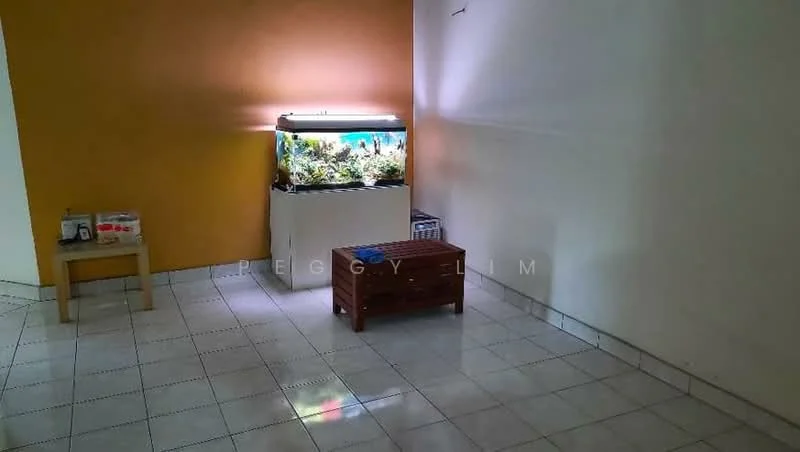Room features: orange accent wall, white painted walls, white tiled flooring, aquarium, wooden coffee table, small side table, decorative items on side table.
