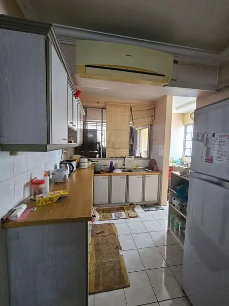 Kitchen features: wooden cabinetry, white tiled backsplash, laminate countertop, stainless-steel sink, freestanding fridge, built-in oven, ceramic tile flooring, wall-mounted split AC, window with sheer curtains, kitchen towels, kitchen utensils, open shelving, floor mat.