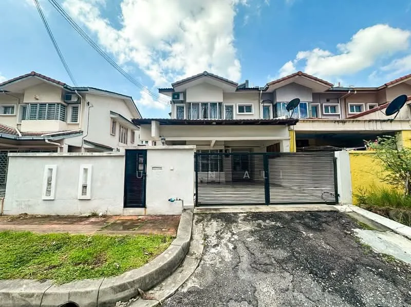 Exterior type: linked terrace house; features: white painted facade, metal gate, paved driveway, front garden with grass, two-storey structure, satellite dishes on roof, clear blue sky, surrounding residential area; style: modern.