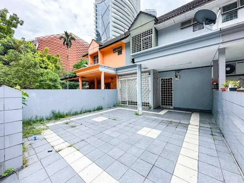 Exterior type: linked terrace house; features: grey tiled flooring, fenced yard, outdoor space with minimal landscaping, covered porch area, satellite dish on roof, surrounded by urban buildings, two-storey structure, gated entrance; style: modern.