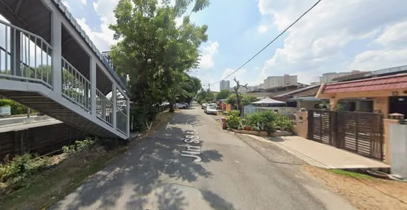 Exterior features: tree-lined street, paved road, residential houses, parking spaces visible, sidewalk, overhead power lines, nearby low-rise buildings.
