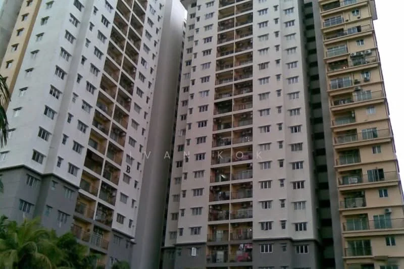 Exterior type: high-rise condominium; features: grey and white painted facade, balconies visible on multiple floors, glass windows, approximately 20-storey high-rise, surrounded by greenery, urban context with nearby buildings; style: modern.