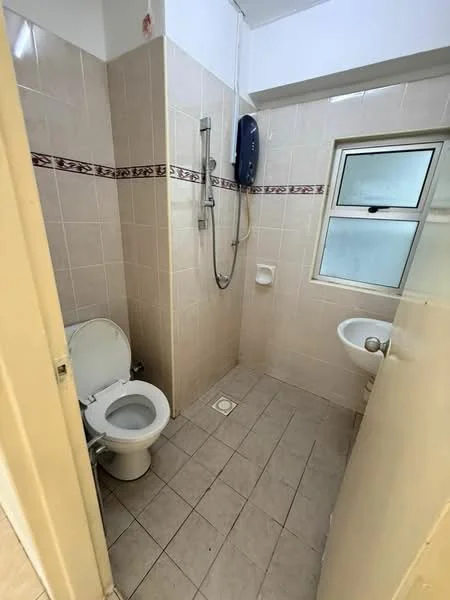 Bathroom features: white tiled walls, beige tiled flooring, toilet, shower with handheld showerhead, window, sink with faucet, wall-mounted water heater.