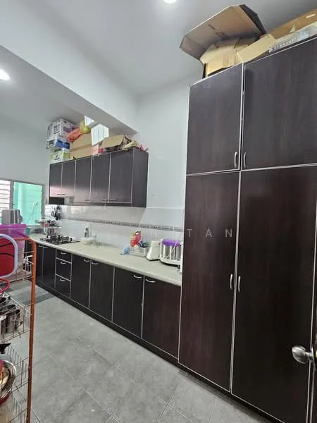 Kitchen features: dark wood cabinetry, light-colored countertop, stainless-steel sink, chrome faucet, tile backsplash, grey tile flooring, overhead cabinets, kitchen appliances visible, storage boxes on top of cabinets, wall-mounted shelving; style: modern.