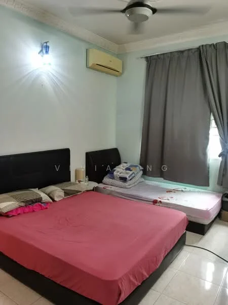 Bedroom features: two beds with black leather headboards, pink bedspread on one bed, blue and white bedding on the other bed, cream tiled flooring, light blue painted walls, curtains in grey, wall-mounted air conditioning unit, ceiling fan with light, decorative wall sconce.