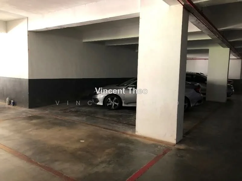 Exterior type: parking deck; features: concrete flooring, painted grey walls, striped parking lines, multiple parking spaces, columns supporting structure, overhead lighting; style: modern.
