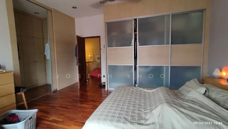 Bedroom features: wooden flooring, queen-size bed with beige bedding, built-in wardrobe with sliding glass doors, wooden dresser, table lamp, basket for laundry, wall-mounted mirror, ceiling fan, neutral wall color; style: modern. Room features: wooden door, light-colored walls, closet with sliding doors.