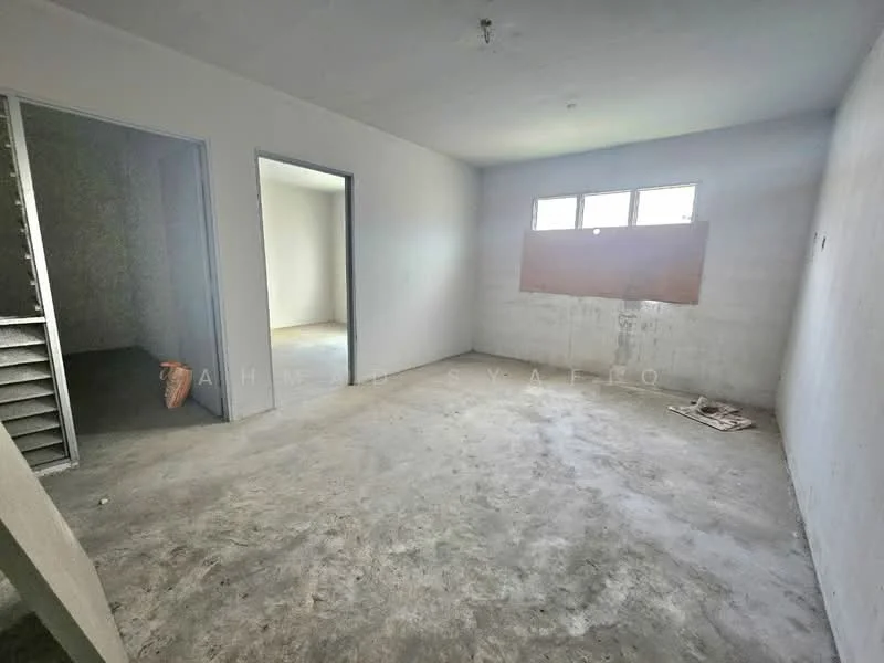 Room features: unfinished concrete flooring, plain white walls, two windows, one door, exposed ceiling, no visible fixtures or fittings.