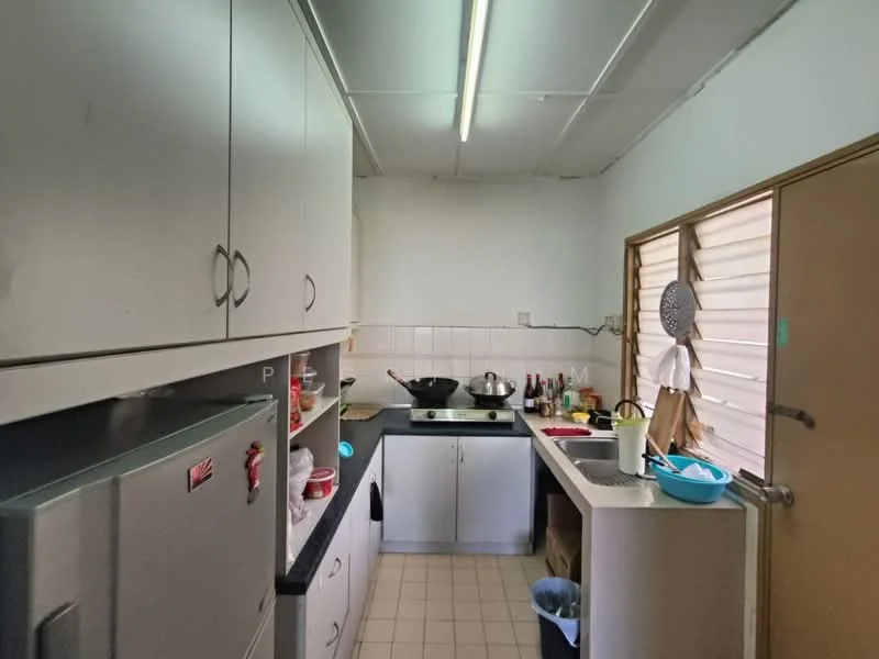 Kitchen features: white cabinetry, black countertop, stainless-steel fridge, built-in gas stove, wall-mounted exhaust hood, sink with faucet, tile backsplash, window with blinds, floor tiles, open shelving, kitchen utensils on countertop, cooking pot on stove.