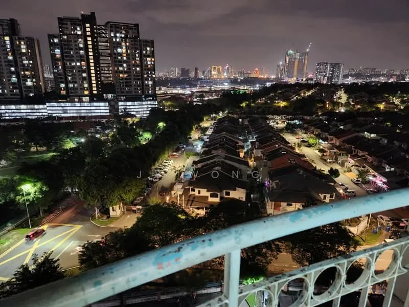 Exterior type: high-rise condominium; features: city skyline view, night lighting, surrounded by greenery, residential area, street view with parked cars, multiple-storey buildings in background; style: modern.