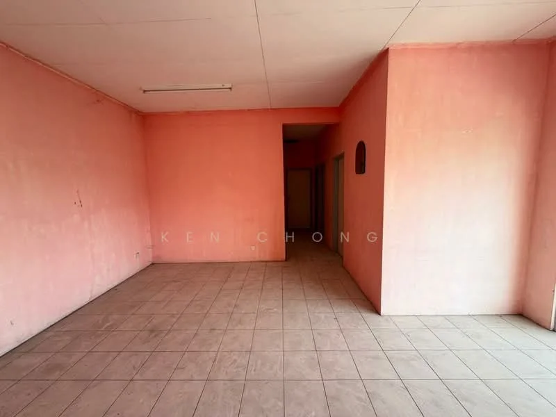 Room features: pink painted walls, tile flooring, ceiling light fixture, doorway leading to other rooms.