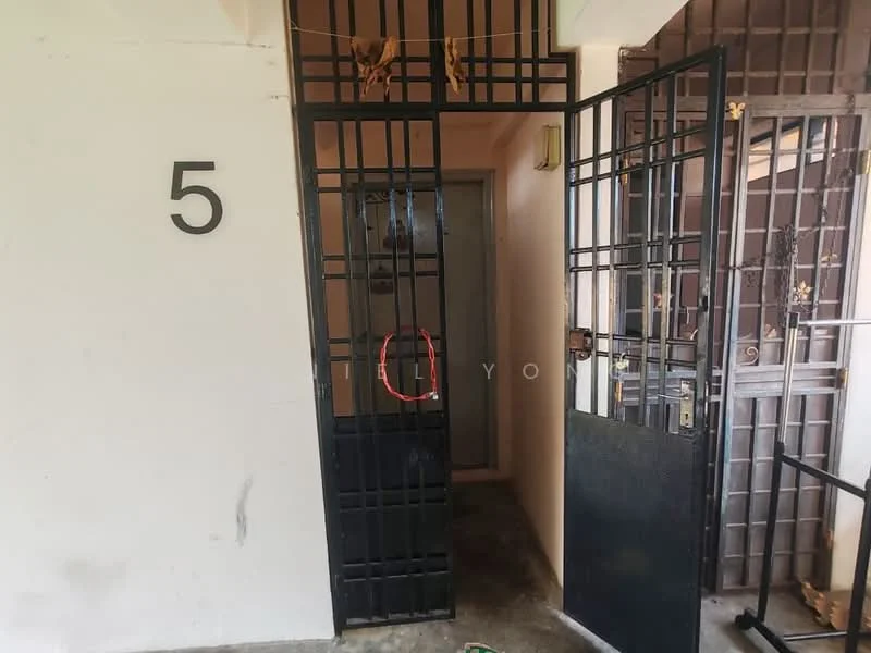 Exterior features: black metal security gate, number 5 displayed on wall, concrete flooring, entrance door, grilled door design, open doorway; style: modern.