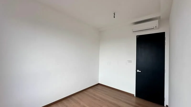 Room features: white painted walls, wooden flooring, 1 wall-mounted split AC, black door.