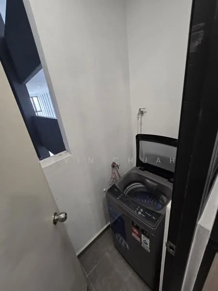 Laundry features: front-load washing machine, grey tiled flooring, white painted walls, door leading to hallway, wall-mounted water supply, ventilation opening, light fixture.