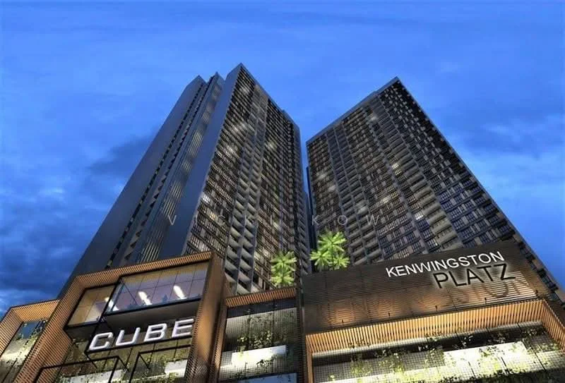 Exterior type: high-rise condominium; features: glass curtain wall, exposed concrete facade, recessed balconies, feature lighting at night, signage for Kenwingston Platz, landscaping with palm trees; style: modern.