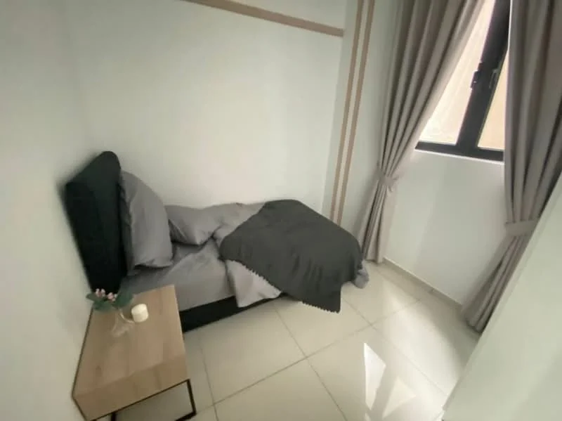 Bedroom features: single bed with grey bedding, black upholstered headboard, nightstand with light-colored wood finish, decorative vase on nightstand, grey curtains, floor-to-ceiling window, glossy tile flooring, white painted walls; style: modern.