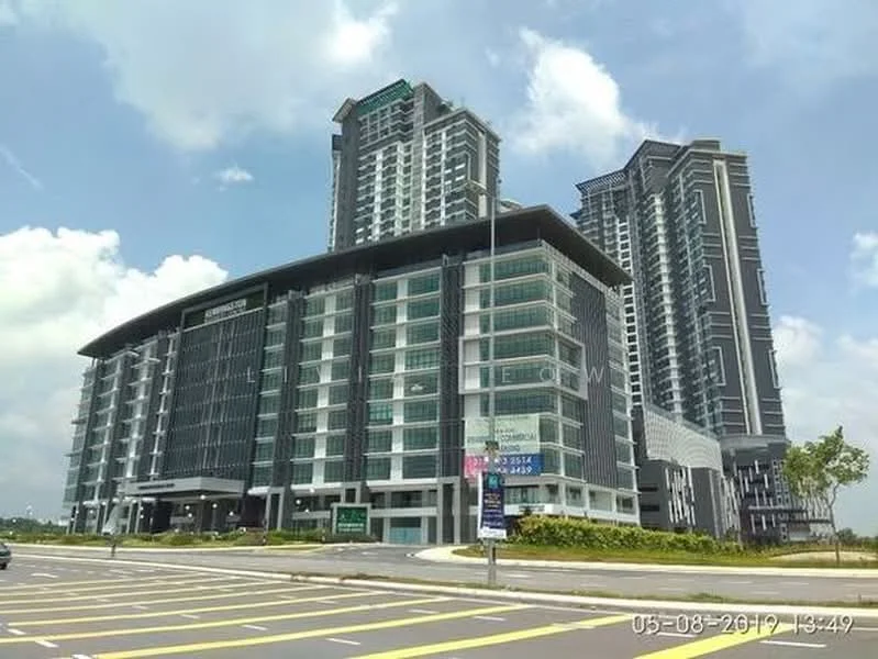 Exterior type: high-rise condominium; features: glass curtain wall, exposed concrete facade, recessed balconies, multiple storeys, landscaped surroundings, paved driveway, signage at entrance, modern architectural design; style: modern.