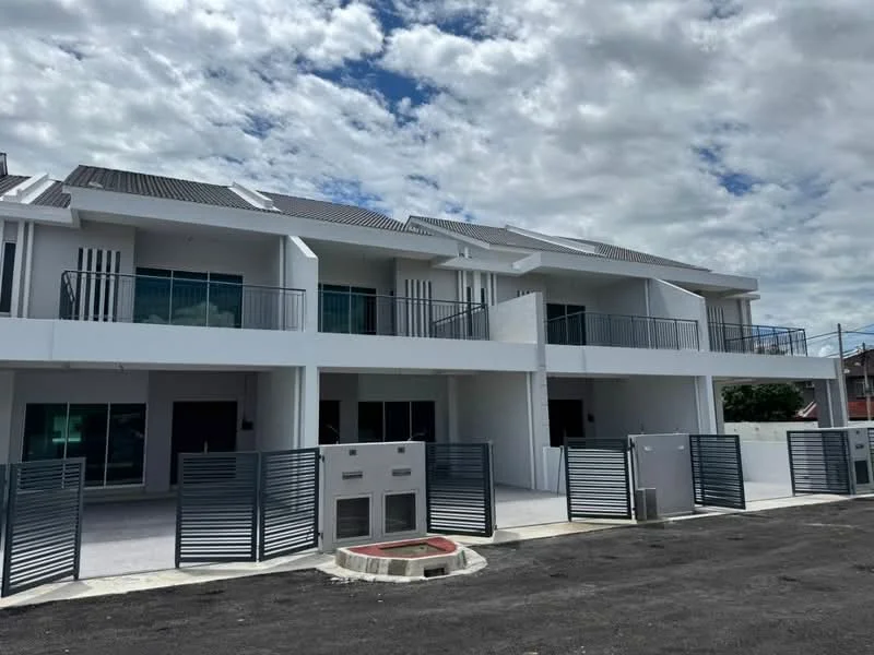 Exterior type: linked terrace house; features: white painted facade, flat roof, approximately 2-storey, glass sliding doors, balconies with railings, manicured walkway, gated entrance, parking area in front; style: modern.