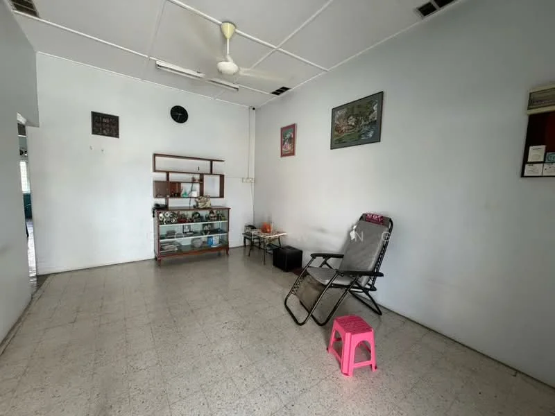 Living features: white painted walls, tile flooring, ceiling fan, wall clock, framed artwork, display shelf, folding chair, pink stool, air conditioning unit.