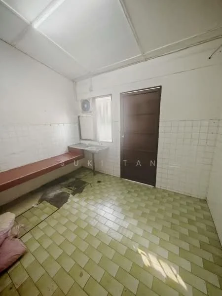Laundry features: green and white checkered tile flooring, white tiled walls, single-basin sink, wooden countertop, brown wooden door, wall-mounted air conditioning unit, natural light from window, built-in bench seating, exposed ceiling beams.