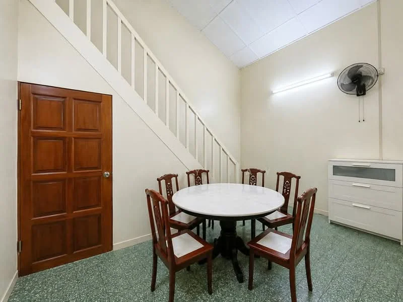 Dining features: round dining table with marble top, 6 wooden dining chairs, green terrazzo flooring, cream painted walls, wooden door with panel design, wall-mounted ceiling fan, built-in white cabinet, staircase leading to upper level, LED strip lighting; style: modern.
