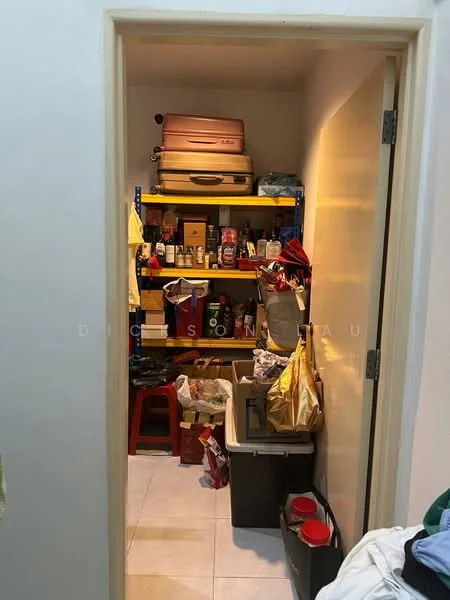 Room features: white painted walls, tile flooring, shelves with various items, luggage, storage boxes, cleaning supplies, plastic containers, red stools.