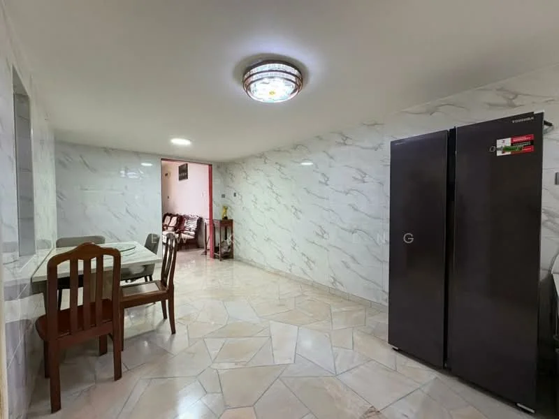 Room features: marble tile flooring, white marble walls with grey veining, recessed ceiling lights, chandelier light fixture, stainless-steel fridge, wooden dining table with four chairs, open layout, wall-mounted light switch; style: modern.