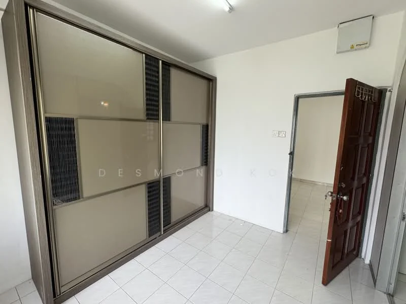 Room features: white painted walls, glossy white tile flooring, built-in wardrobe with sliding doors, single wooden door with metal handle, ceiling light fixture, corner of room with no visible furniture; style: modern.