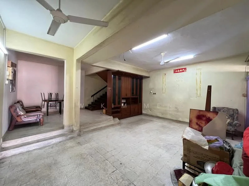 Living features: ceiling fan, marble flooring, light-colored walls, wooden staircase, open layout, natural light from windows, seating area with sofa, dining table with chairs, storage boxes, decorative items, wall-mounted light fixture; style: traditional. Room features: light-colored walls, marble flooring, ceiling fan, wooden staircase, storage boxes.