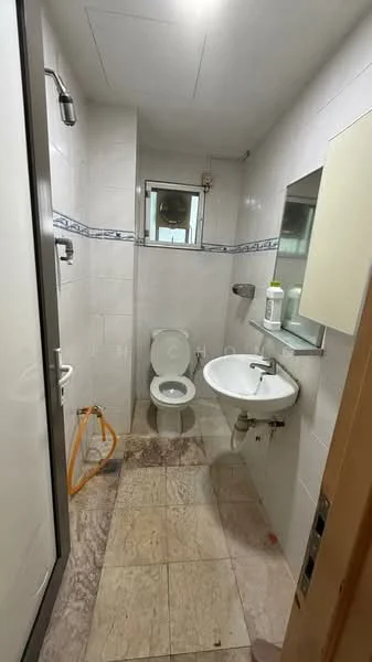 Bathroom features: white tiled walls, cream marble tile flooring, one-piece toilet, sink with chrome faucet, mirror above sink, shower area with glass door, window for natural light, toiletries on shelf, towel rack, wall-mounted light fixture; style: modern.