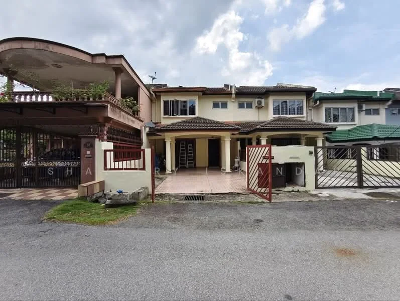 Exterior type: linked terrace house; features: two-storey building, red brick facade, tiled roof, covered car porch, manicured lawn, gated entry, paved driveway, balcony on upper floor, front porch area, surrounded by greenery; style: modern.