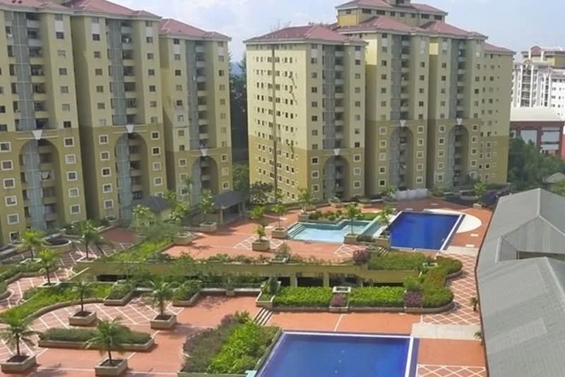 Exterior type: high-rise condominium; features: multiple high-rise buildings, swimming pools, landscaped gardens, paved walkways, palm trees, outdoor seating areas, water features, manicured lawns; style: modern.