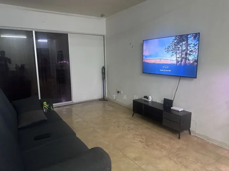 Living features: 3-seater fabric sofa in dark grey, flat-screen TV mounted on wall, TV console in black, large sliding glass door, cream painted walls, tile flooring, decorative wall art, remote control on sofa; style: modern.