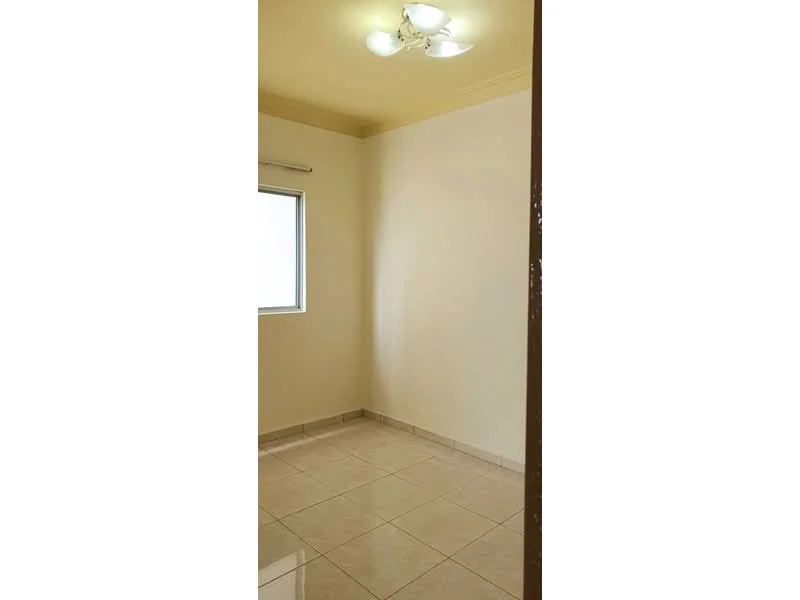 Room features: cream painted walls, tile flooring, window with blinds, ceiling light fixture with four bulbs.