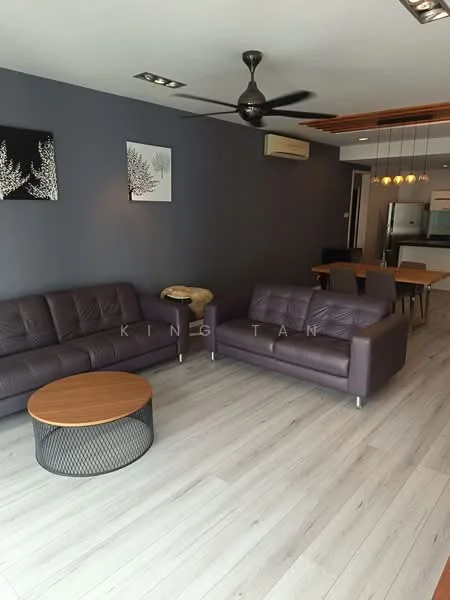 Living features: grey painted walls, wooden flooring, 5-blade ceiling fan with light, 2-seater leather sofa in dark brown, 3-seater leather sofa in dark brown, round wooden coffee table with metal base, wall-mounted artwork, recessed downlights, air conditioning unit; style: modern.