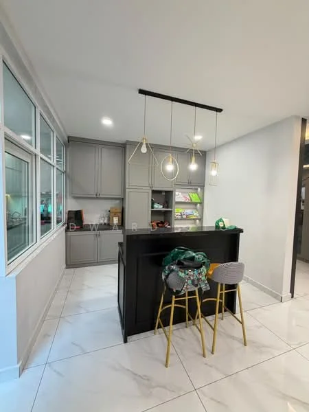 Room features: grey cabinetry, black kitchen island, marble tile flooring, pendant lighting, bar stools with gold legs, open shelving, large windows, recessed ceiling lights; style: modern.