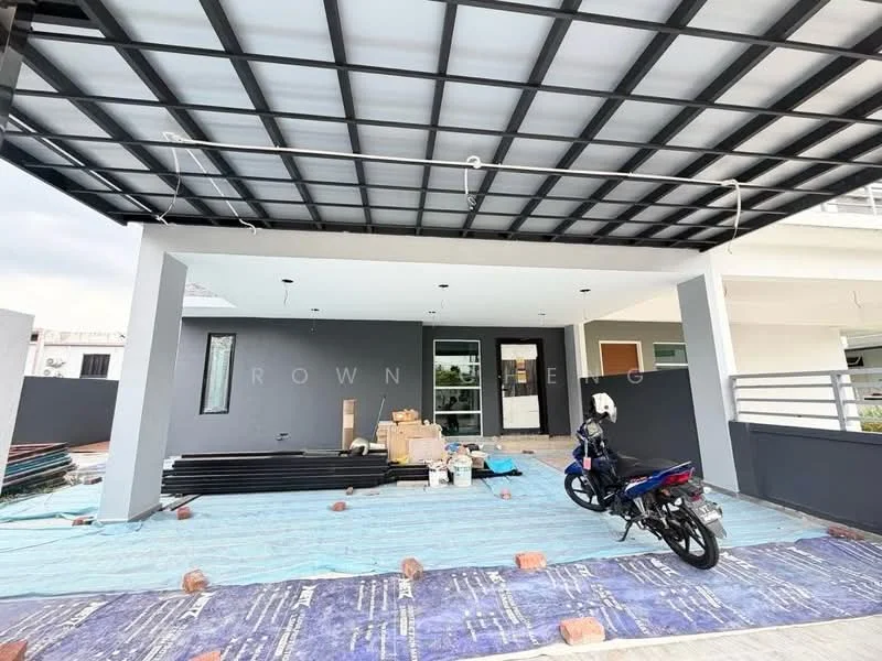 Exterior features: covered car porch with metal roofing, grey painted facade, large glass entrance door, windows with black frames, concrete flooring, landscaping materials scattered on the ground, motorcycle parked in front, blue tarpaulin on the ground; style: modern.