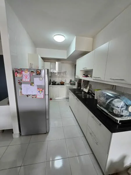 Kitchen features: white cabinetry, black countertop, stainless-steel fridge, built-in oven, ceramic tile flooring, recessed ceiling light, kitchen island, sink with faucet, wall-mounted cabinets, open shelving, decorative magnets on fridge; style: modern.