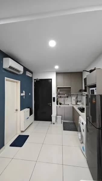 Kitchen features: white cabinetry, grey countertop, stainless-steel fridge, built-in microwave, freestanding washing machine, 4-burner gas hob, stainless-steel range hood, white tiled backsplash, white tiled flooring, 1 wall-mounted split AC, recessed LED downlights, dark blue accent wall, black door, kitchen mat; style: modern.