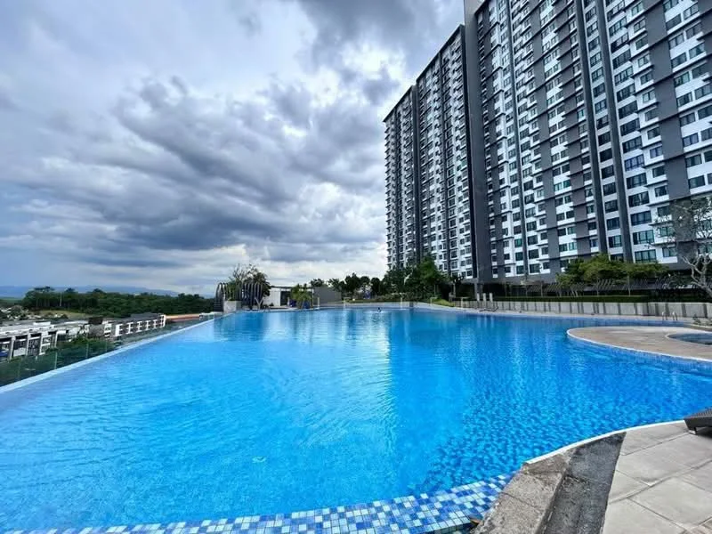 Exterior type: high-rise condominium; features: infinity pool, pool deck with loungers, surrounded by greenery, modern architectural design, large windows on building facade, landscaped garden area, view of city skyline, concrete pool edge, tiled pool surface, multi-storey building; style: modern.