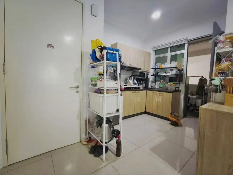 Kitchen features: white painted walls, cream cabinetry, black countertop, stainless-steel sink, chrome pull-down faucet, built-in stove, microwave, refrigerator, tile flooring, open shelving, kitchen utensils, broom and cleaning supplies, window with natural light; style: modern. Room features: white door, storage rack with various items.