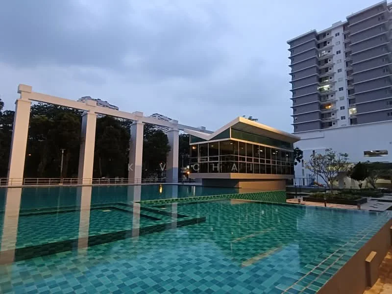 Exterior type: high-rise condominium; features: infinity pool, pool deck with loungers, landscaped garden, modern clubhouse, glass facade on clubhouse, surrounded by greenery, tiled pool surface, outdoor lighting, water feature, multiple storeys in background; style: modern.