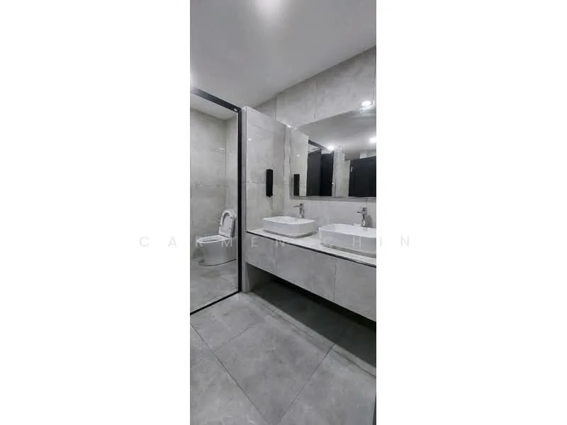 Bathroom features: grey tile flooring, grey wall tiles, white rectangular sink, chrome basin mixer faucet, wall-mounted toilet, glass shower enclosure, recessed LED downlights, large mirror above sink, floating vanity with storage; style: modern.