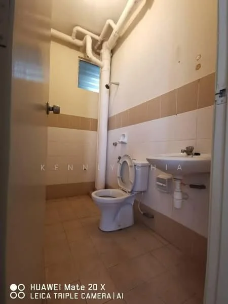 Bathroom features: white tiled walls, beige tiled walls, ceramic tile flooring, one-piece toilet, wall-mounted sink, chrome faucet, window for natural light, exposed plumbing pipes.