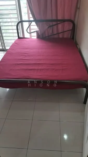 Bedroom features: metal bed frame, queen-size bed, red bed sheet, tiled flooring, curtains in pink, window with blinds, wall with light color, minimal decor.